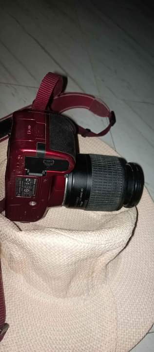 A picture of Camera Nikon d3100 Made in Thailand Excellent condition Lens 55
