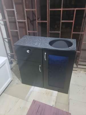 A picture of Kitchen cabinet Tsh 100 000 Showcase tv Tsh 260 000