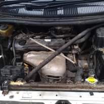 A picture of Naddia 1990cc Full AC Gari kali sanaaa Haijarudiwa rangi popotee