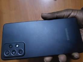 A picture of Still new Samsung galaxy A72 for 500k at my shop...contact