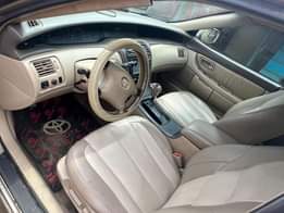 A picture of First Body Toyota Avalon dashboard Engine gear and AC very