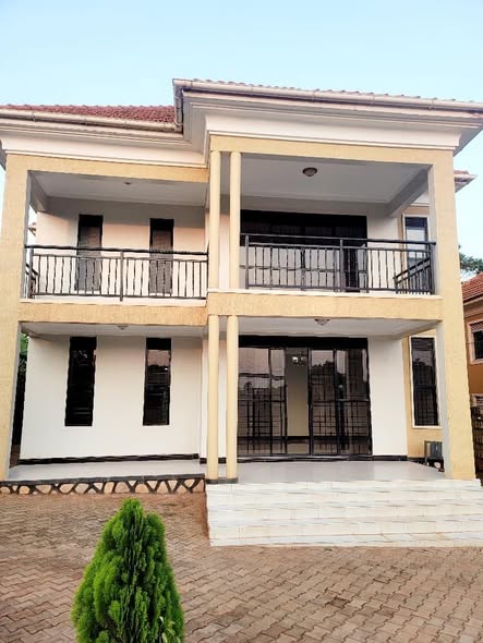 A picture of FLAT HOUSE FOR SALE KITENDE KITOVU ENTEBBE ROAD 4BEDROOMS SEATING