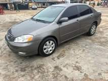 A picture of Toyota Corolla 2004 model pure first body everything is working