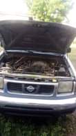 A picture of Nissan frontier 2002 Nigeria used clean body Buy and drive