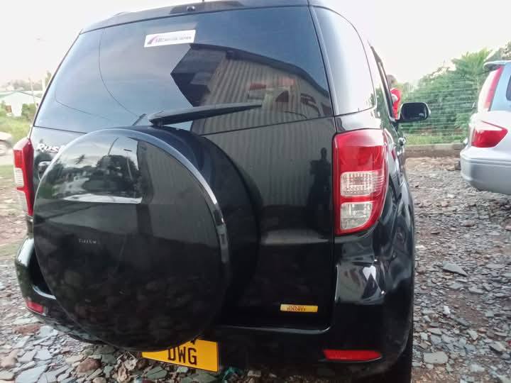 A picture of TOYOTA RUSH CC 1400 FULL AC TAILI MPYA BEI 18.5