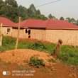 A picture of Quick sale 2plots located at matugga kavule mwelerwe town Good