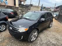 A picture of BRIEFLY USED 2013 FORD EDGE FIRST BODY TOKUNBO STANDARD LOW