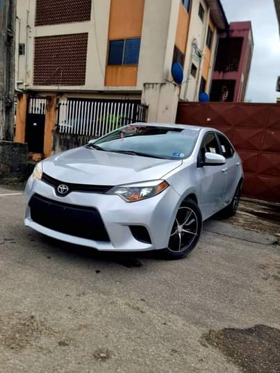 A picture of NEW ARRIVAL FOREIGN USED 2014 COROLLA With Rev Camera Bluetooth