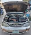 A picture of Nigerian Used Gold Toyota Camry 1996 Orobo