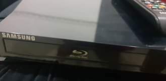 A picture of Blue ray DVD player with Bluetooth used for less than