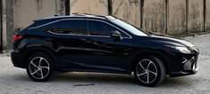 A picture of Toks Premium trim lexus rx350 year 2017 olour Black Tan
