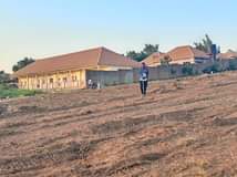 A picture of Matugga sanga new estate power and water on site good