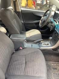 A picture of Distress sale 2010 Toyota Corolla AC chilling android screen with