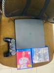 A picture of Sony Ps 4 with FIFA 2022 spider man and call