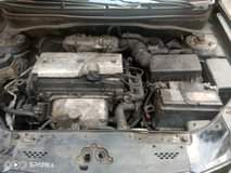 A picture of Dealer market Kia Rio 07 model Automatic transmission Engine top