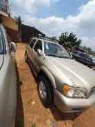 A picture of Clean Nigerian Used Nissan Pathfinder First Body Clean favric interior