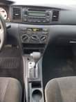 A picture of A foreign used white Corolla Sports very very clean and