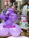 A picture of Flower bouquets and money Hampers