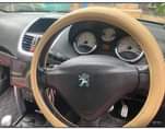 A picture of Peugeot 207 Open Car Year 2009 Engine 1590Cc Dark blue