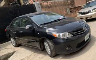 A picture of Make Toyota Model Corolla Year 2011 Color Black