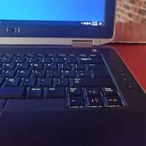 A picture of Five dell laptops one i7 and four i5 all 320gb