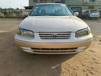 A picture of Now available for sale Toyota Camry tiny light gold color