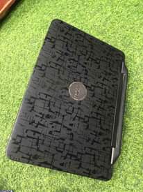 A picture of Dell vostro 1440core i3 imenyooka kila kitu lipia TSH 245