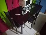 A picture of Slightly used dining table and a tv stand on quick