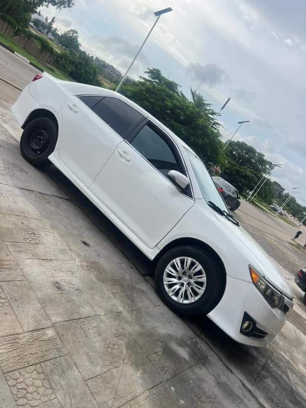 A picture of 2013 MODEL TOYOTA CAMRY LE FOR SALE AT ABUJA 8