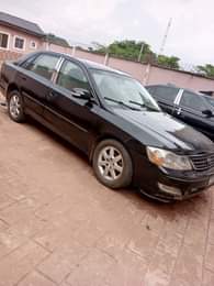 A picture of 04 Toyota Avalon Dashboard Neat in and out Good engine