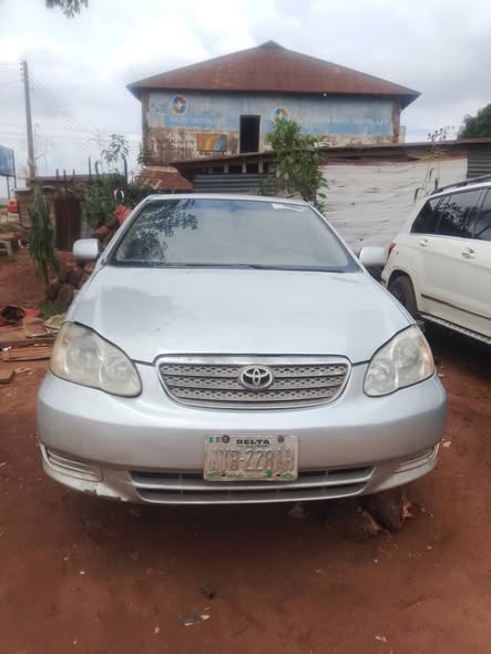 A picture of 2003 Corolla with bad engine