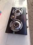 A picture of Three plate gas stove