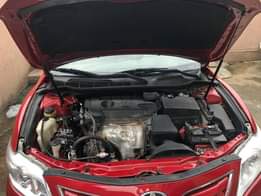 A picture of Fresh And Clean Toyota Camry LE On Ground Now For