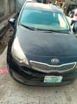 A picture of Kia tapping engine and transmission and ac is work okay