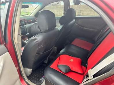 A picture of Toyota Corolla Four plugs Ac chilling Engine and gear transmission