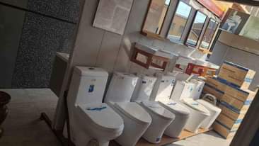 A picture of Tiles toilet seats sinks taps work tops etc