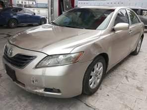 A picture of 2007 Toyota Camry V6 Engine with Neat interior Smooth gear