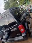 A picture of REGISTERED 2003 LIBERTY JEEP 4X4 ENGINE GEAR AC AND ALL