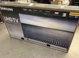 A picture of Samsung TV 65 inches no fault all accessories all available