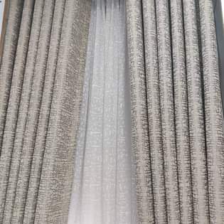 A picture of curtains and rods