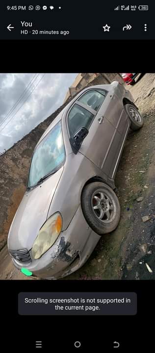 A picture of Toyota Corolla LE year 2004 engine and transmission and ac