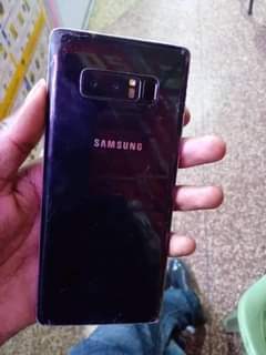 A picture of Samsung note 8 cracked but functional 64gb 6gb ram dual