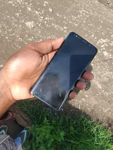 A picture of SAMSUNG S9 PLAIN 64 4GB. BEI 180K MBEYA 0775611349