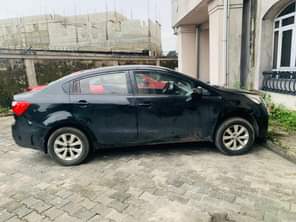 A picture of Neatly Used 2012 KIA RIO Untampered engine Smooth gear AC