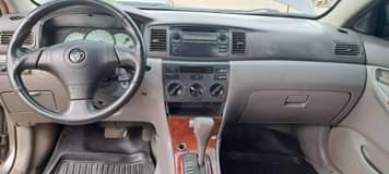 A picture of CLEAN USED TOYOTA COROLLA 2004 IN PERFECT CONDITION BUY AND