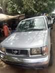 A picture of Nissan frontier 2002 Nigeria used clean body Buy and drive