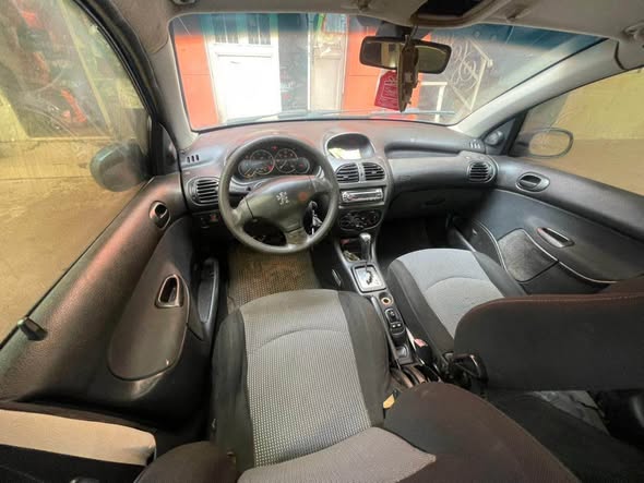 A picture of 206 automatic buy and drive location Abuja kurudu engine ac