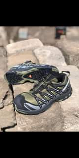 A picture of Salomon and Merrel hiking shoes