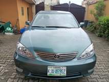 A picture of 2004 Toyota Camry 4plugs baked Clean in and out Engine