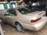 A picture of TOYOTA CAMRY TINGLIGHT VERY SOUND CAR SHARP BODY AND INTERIOR